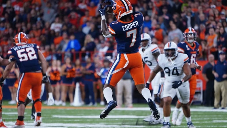 Sep 23, 2022; Syracuse, New York, USA; Syracuse Orange wide receiver Devaughn Cooper (7) catches a pass against the Virginia Cavaliers during the second half at JMA Wireless Dome. Mandatory Credit: Gregory Fisher-USA TODAY Sports