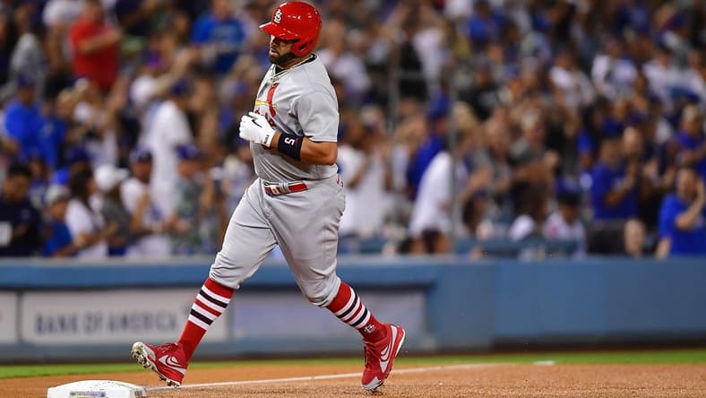 Sep 23, 2022; Los Angeles, California, USA; St. Louis Cardinals designated hitter Albert Pujols (5) rounds the bases after hitting a two run home run and the 699th of his career against the Los Angeles Dodgers during the third inning at Dodger Stadium. Mandatory Credit: Gary A. Vasquez-USA TODAY Sports