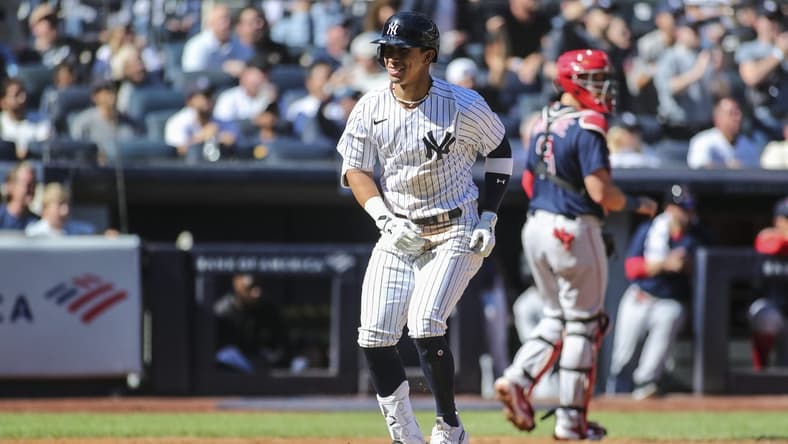 Sep 24, 2022; Bronx, New York, USA;  New York Yankees left fielder Oswaldo Cabrera (95) hits a two run home run in the fourth inning against the Boston Red Sox at Yankee Stadium. Mandatory Credit: Wendell Cruz-USA TODAY Sports