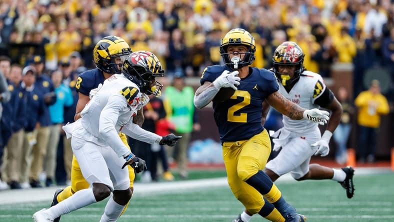 Michigan running back Blake Corum (2) runs against Maryland during the first half at the Michigan Stadium in Ann Arbor on Saturday, Sept. 24, 2022.