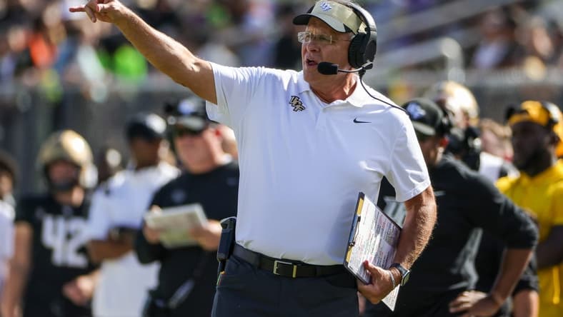 Sep 24, 2022; Orlando, Florida, USA; UCF Knights head coach Gus Malzahn calls a play during the second quarter against the Georgia Tech Yellow Jackets at FBC Mortgage Stadium. Mandatory Credit: Mike Watters-USA TODAY Sports