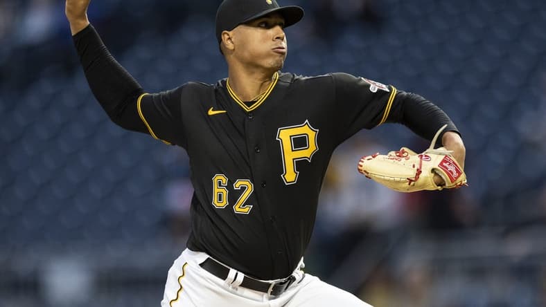 Sep 24, 2022; Pittsburgh, Pennsylvania, USA; Pittsburgh Pirates starting pitcher Johan Oviedo (62) throws against the Chicago Cubs in the first inning at PNC Park. Mandatory Credit: Scott Galvin-USA TODAY Sports