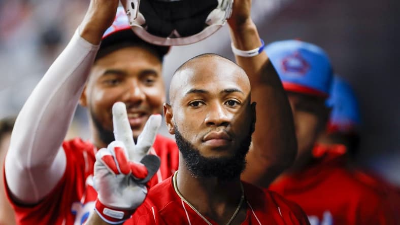 Sep 24, 2022; Miami, Florida, USA; Miami Marlins center fielder Bryan De La Cruz (14) reacts in the dugout after hitting a home run against the Washington Nationals during the fourth inning at loanDepot Park. Mandatory Credit: Sam Navarro-USA TODAY Sports