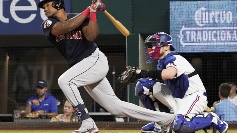 Sep 24, 2022; Arlington, Texas, USA; Cleveland Guardians right fielder Oscar Gonzalez (39) follows thru on a solo home run during the fifth inning against the Texas Rangers at Globe Life Field. Mandatory Credit: Raymond Carlin III-USA TODAY Sports