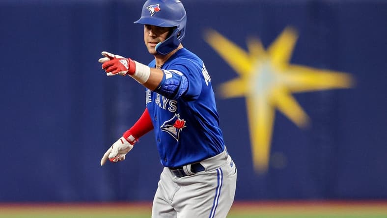 Sep 24, 2022; St. Petersburg, Florida, USA; Toronto Blue Jays center fielder Whit Merrifield (1) reacts after hitting a three-run home run against the Tampa Bay Rays in the seventh inning at Tropicana Field. Mandatory Credit: Nathan Ray Seebeck-USA TODAY Sports