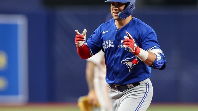 Sep 24, 2022; St. Petersburg, Florida, USA; Toronto Blue Jays center fielder Whit Merrifield (1) reacts after hitting a three-run home run against the Tampa Bay Rays in the seventh inning at Tropicana Field. Mandatory Credit: Nathan Ray Seebeck-USA TODAY Sports