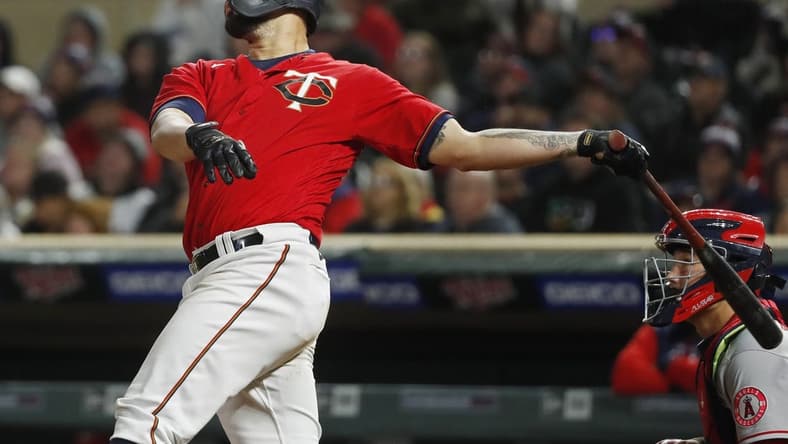 Sep 24, 2022; Minneapolis, Minnesota, USA; Minnesota Twins catcher Gary Sanchez (24) hits a three-run home run against the Los Angeles Angels in the fifth inning at Target Field. Mandatory Credit: Bruce Kluckhohn-USA TODAY Sports