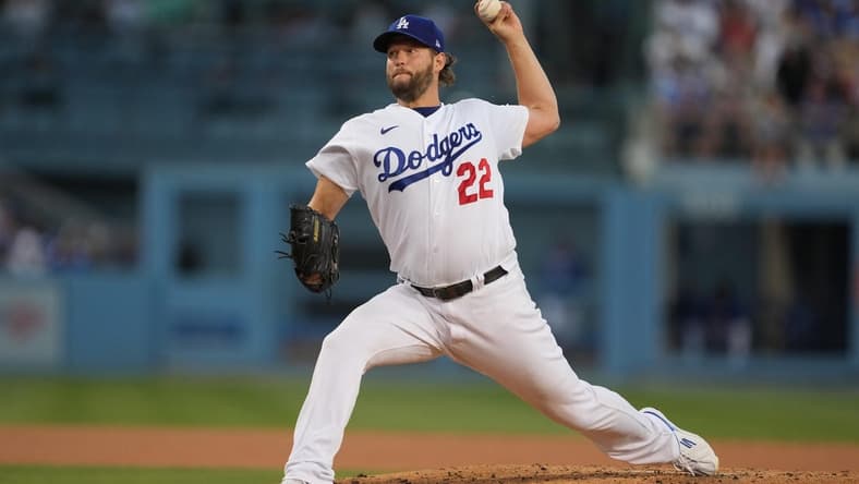 Sep 24, 2022; Los Angeles, California, USA; Los Angeles Dodgers starting pitcher Clayton Kershaw (22) throws against the St. Louis Cardinals in the second inning at Dodger Stadium. Mandatory Credit: Kirby Lee-USA TODAY Sports