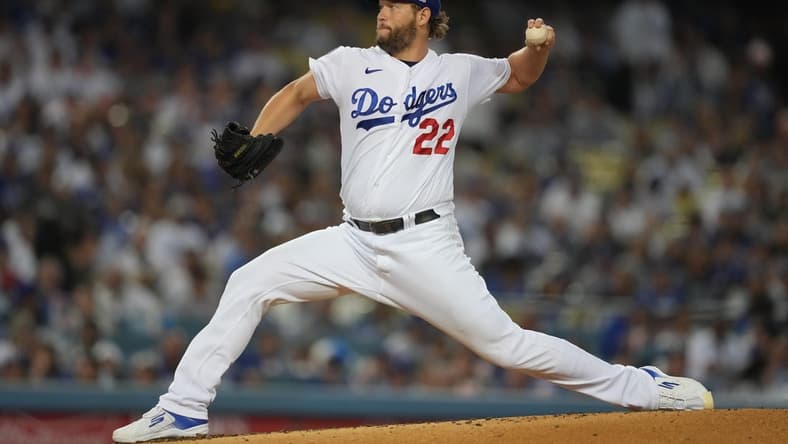 Sep 24, 2022; Los Angeles, California, USA; Los Angeles Dodgers starting pitcher Clayton Kershaw (22) throws against the St. Louis Cardinals in the third inning at Dodger Stadium. Mandatory Credit: Kirby Lee-USA TODAY Sports