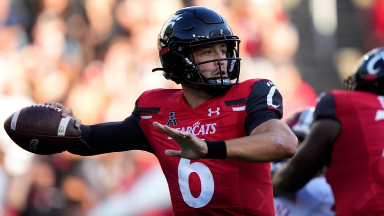 Sep 24, 2022; Cincinnati, Ohio, USA; Cincinnati Bearcats quarterback Ben Bryant (6) throws against the Indiana Hoosiers in the third quarter at Nippert Stadium. Mandatory Credit: Kareem Elgazzar/Cincinnati Enquirer via USA TODAY NETWORK