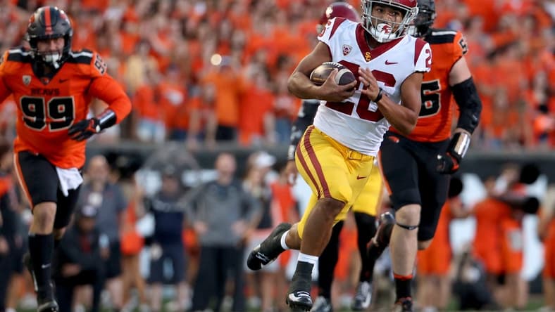 Sep 24, 2022; Corvallis, Oregon, USA;  USC Trojans running back Travis Dye (26) runs against the Oregon State Beavers in the first half at Reser Stadium. Mandatory Credit: Jaime Valdez-USA TODAY Sports