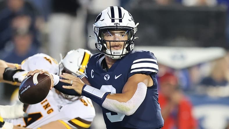 Sep 24, 2022; Provo, Utah, USA; Brigham Young Cougars quarterback Jaren Hall (3) throws the ball against the Wyoming Cowboys in the second quarter at LaVell Edwards Stadium. Mandatory Credit: Rob Gray-USA TODAY Sports