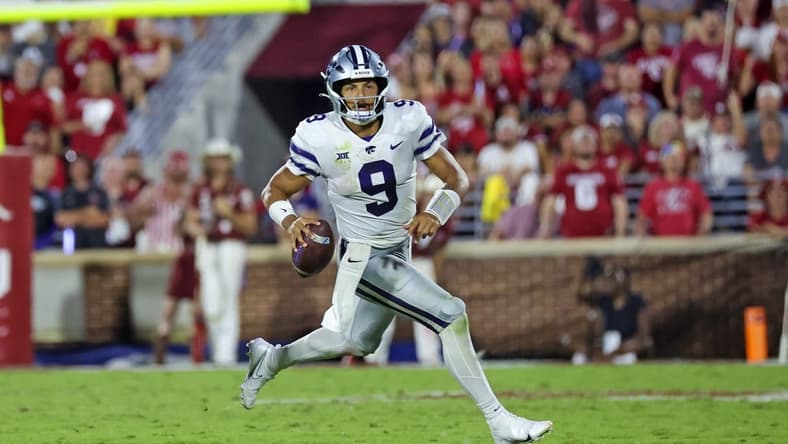 Sep 24, 2022; Norman, Oklahoma, USA;  Kansas State Wildcats quarterback Adrian Martinez (9) looks to pass during the second half against the Oklahoma Sooners at Gaylord Family-Oklahoma Memorial Stadium. Mandatory Credit: Kevin Jairaj-USA TODAY Sports