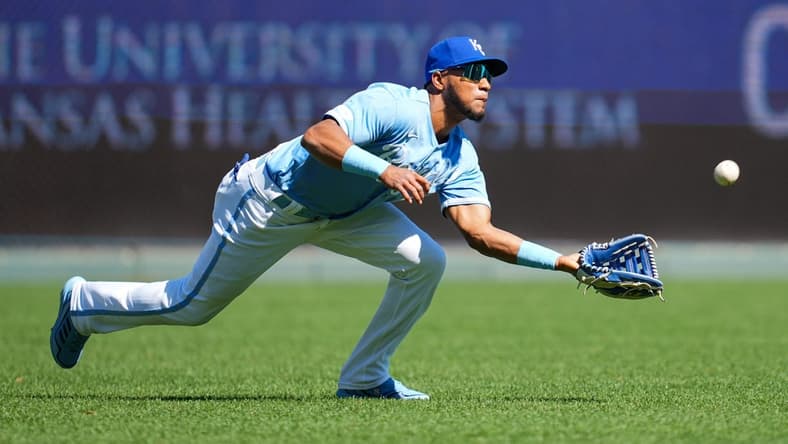 Sep 25, 2022; Kansas City, Missouri, USA; Kansas City Royals left fielder Edward Olivares (14) catches a line drive during the second inning against the Seattle Mariners at Kauffman Stadium. Mandatory Credit: Jay Biggerstaff-USA TODAY Sports