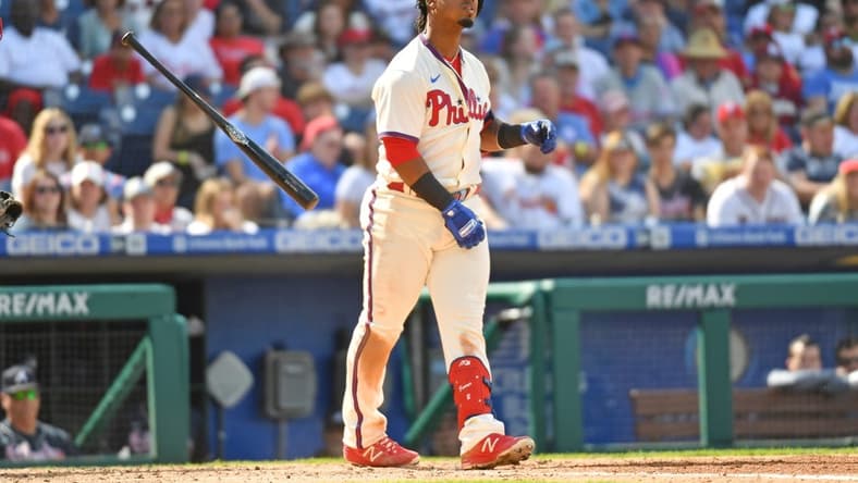 Sep 25, 2022; Philadelphia, Pennsylvania, USA; Philadelphia Phillies second baseman Jean Segura (2) reacts after striking out against the Atlanta Braves during the third inning at Citizens Bank Park. Mandatory Credit: Eric Hartline-USA TODAY Sports