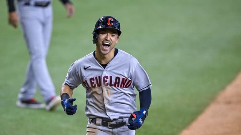 Sep 25, 2022; Arlington, Texas, USA; Cleveland Guardians left fielder Steven Kwan (38) smiles as he rounds the bases after he hits a grand slam against the Texas Rangers during the eighth inning at Globe Life Field. Mandatory Credit: Jerome Miron-USA TODAY Sports