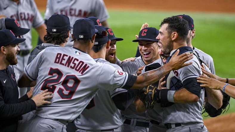 Sep 25, 2022; Arlington, Texas, USA; The Cleveland Guardians celebrate on the field after they clinch their first AL Central title since 2018 after the victory over the Texas Rangers at Globe Life Field. Mandatory Credit: Jerome Miron-USA TODAY Sports