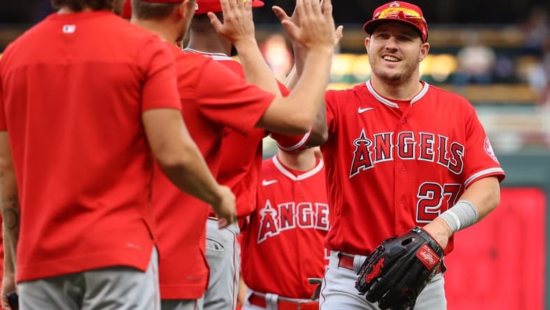 Sep 25, 2022; Minneapolis, Minnesota, USA; Los Angeles Angels center fielder Mike Trout (27) celebrates the win against the Minnesota Twins at Target Field. Mandatory Credit: Matt Krohn-USA TODAY Sports