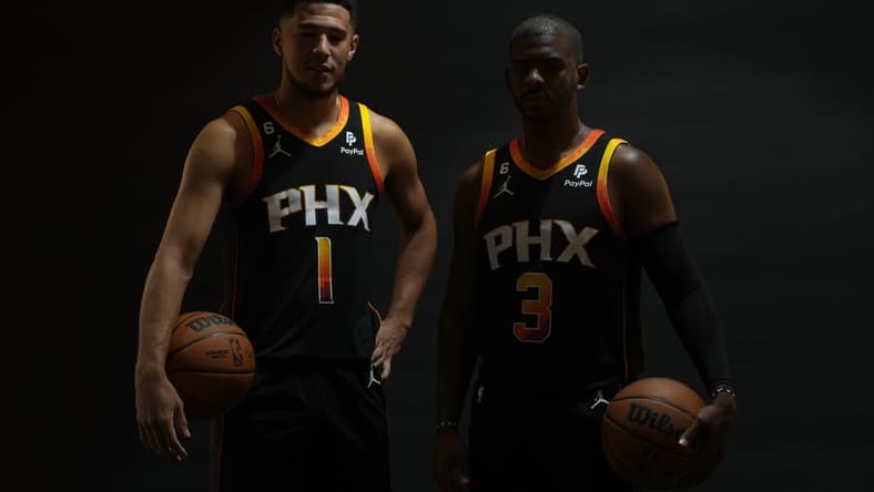 Sep 26, 2022; Phoenix, AZ, USA; Phoenix Suns guard Devin Booker (1) and Phoenix Suns guard Chris Paul (3) pose for a photo during Suns Media Day at Events on Jackson Mandatory Credit: Joe Camporeale-USA TODAY Sports