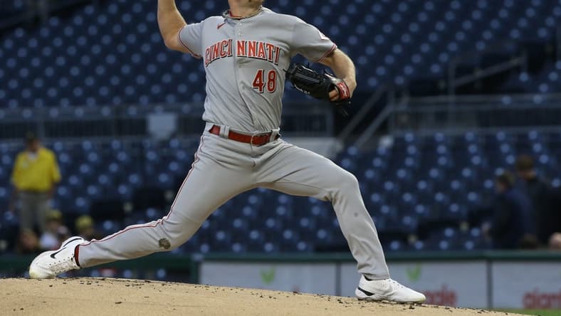 Sep 26, 2022; Pittsburgh, Pennsylvania, USA; Cincinnati Reds starting pitcher Chase Anderson (48) throws a pitch against the Pittsburgh Pirates during the first inning at PNC Park. Mandatory Credit: Charles LeClaire-USA TODAY Sports