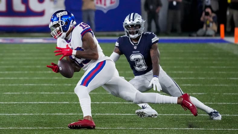 Sep 26, 2022; East Rutherford, NJ, USA; New York Giants wide receiver Kenny Golladay (19) tries to catch the ball as Dallas Cowboys cornerback Anthony Brown (3) defends during the second half at MetLife Stadium. Mandatory Credit: Robert Deutsch-USA TODAY Sports