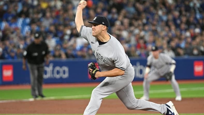 Sep 27, 2022; Toronto, Ontario, CAN;  New York Yankees starting pitcher Jameson Taillon (50) delivers a pitch against the Toronto Blue Jays in the first inning at Rogers Centre. Mandatory Credit: Dan Hamilton-USA TODAY Sports