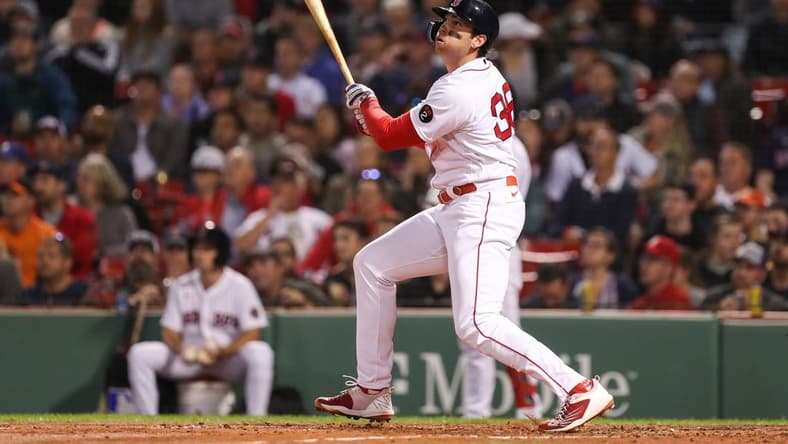 Sep 27, 2022; Boston, Massachusetts, USA; Boston Red Sox first baseman Triston Casas (36) hits a home run during the second inning against the Baltimore Orioles at Fenway Park. Mandatory Credit: Paul Rutherford-USA TODAY Sports