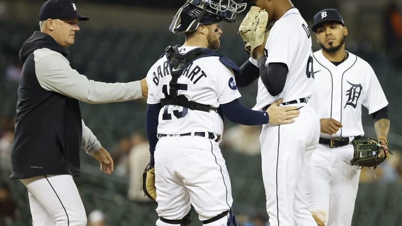 Sep 27, 2022; Detroit, Michigan, USA;  Detroit Tigers manager A.J. Hinch (14) takes the ball to relieve relief pitcher Angel De Jesus (62) in the eighth inning against the Kansas City Royals at Comerica Park. Mandatory Credit: Rick Osentoski-USA TODAY Sports