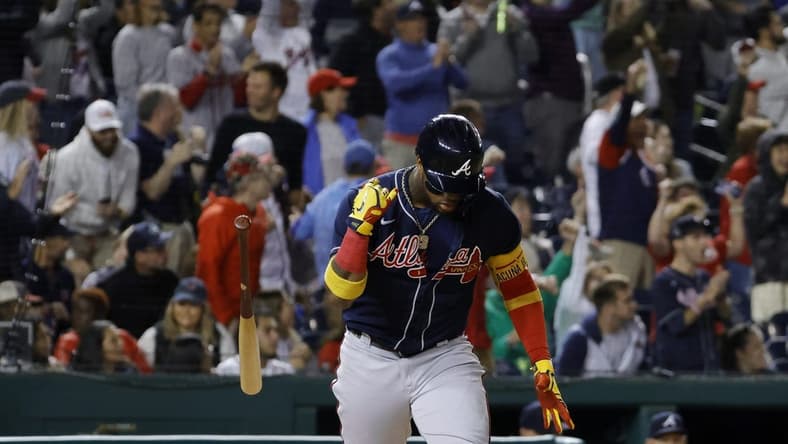 Sep 27, 2022; Washington, District of Columbia, USA; Atlanta Braves right fielder Ronald Acuna Jr. (13) flips his bat after hitting a home run against the Washington Nationals during the fifth inning at Nationals Park. Mandatory Credit: Geoff Burke-USA TODAY Sports