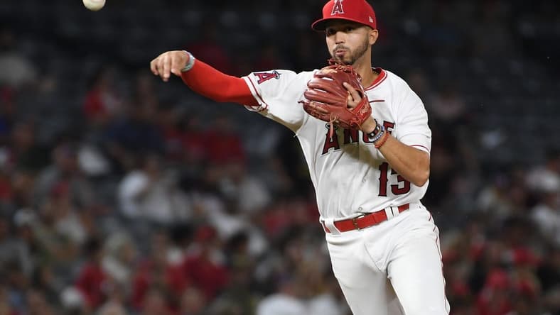 Sep 27, 2022; Anaheim, California, USA; Los Angeles Angels shortstop Livan Soto (13) throws to first for an out in the third inning against the Oakland Athletics at Angel Stadium. Mandatory Credit: Richard Mackson-USA TODAY Sports