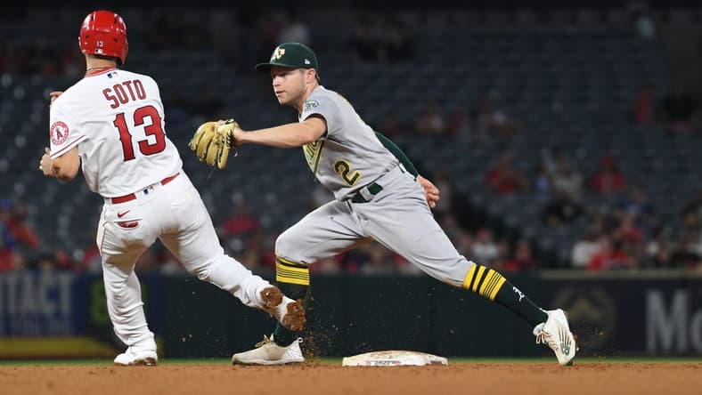 Sep 27, 2022; Anaheim, California, USA; Oakland Athletics second baseman Nick Allen (2) for Los Angeles Angels shortstop Livan Soto (13) out in the fourth inning at Angel Stadium. Mandatory Credit: Richard Mackson-USA TODAY Sports