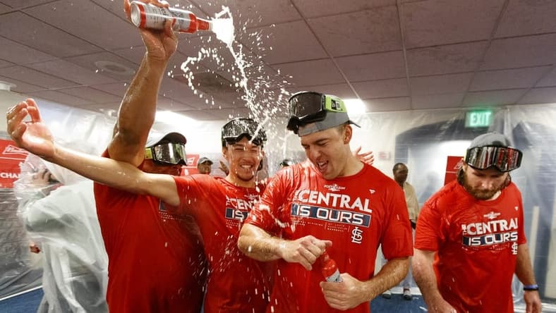 Sep 27, 2022; Milwaukee, Wisconsin, USA; The St. Louis Cardinals celebrate winning the National League Central Division by defeating the Milwaukee Brewers at American Family Field. Mandatory Credit: Jeff Hanisch-USA TODAY Sports