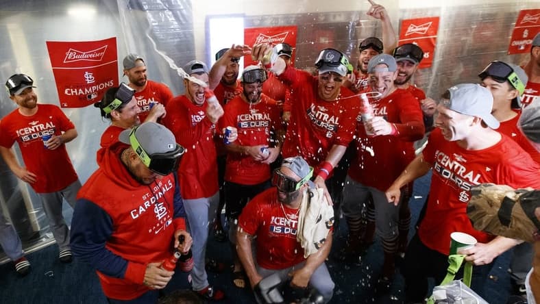 Sep 27, 2022; Milwaukee, Wisconsin, USA; The St. Louis Cardinals celebrate winning the National League Central Division by defeating the Milwaukee Brewers at American Family Field. Mandatory Credit: Jeff Hanisch-USA TODAY Sports