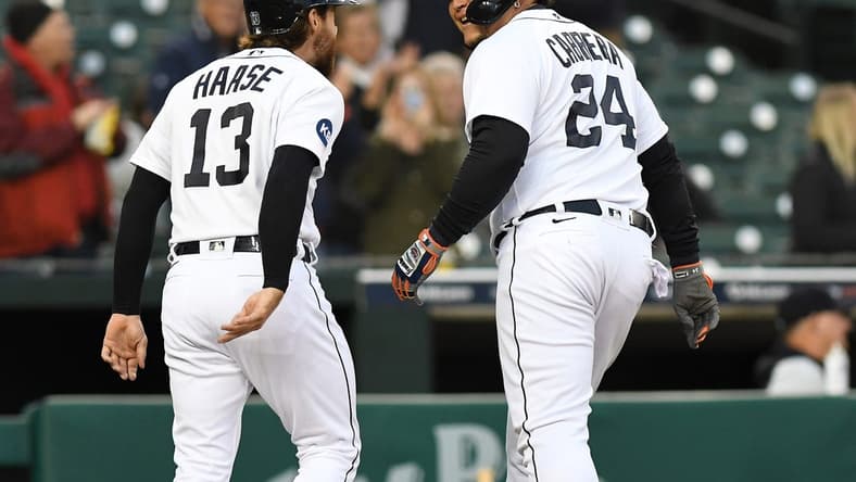 Sep 28, 2022; Detroit, Michigan, USA; Detroit Tigers designated hitter Miguel Cabrera (24) celebrates with catcher Eric Haase (13) after driving him in after hitting a two-run home run off Kansas City Royals starting pitcher Daniel Lynch (not pictured) in the second inning at Comerica Park. Mandatory Credit: Lon Horwedel-USA TODAY Sports