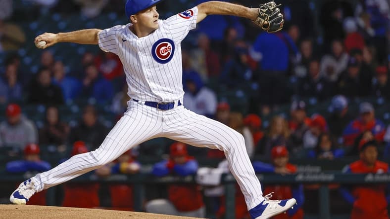 Sep 28, 2022; Chicago, Illinois, USA; Chicago Cubs starting pitcher Hayden Wesneski (19) delivers against the Philadelphia Phillies during the first inning at Wrigley Field. Mandatory Credit: Kamil Krzaczynski-USA TODAY Sports