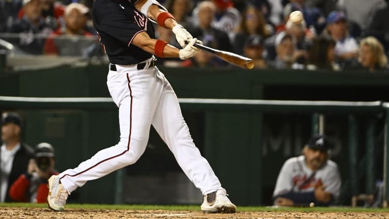 Sep 28, 2022; Washington, District of Columbia, USA; Washington Nationals left fielder Alex Call (62) singles against the Atlanta Braves during the fourth inning at Nationals Park. Mandatory Credit: Brad Mills-USA TODAY Sports