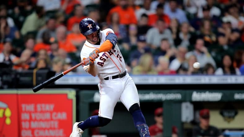 Sep 28, 2022; Houston, Texas, USA; Houston Astros left fielder Chas McCormick (20) hits a two-run home run to right field against the Arizona Diamondbacks during the fifth inning at Minute Maid Park. Mandatory Credit: Erik Williams-USA TODAY Sports
