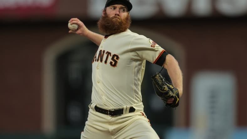 Sep 28, 2022; San Francisco, California, USA; San Francisco Giants starting pitcher John Brebbia (59) throws a pitch during the first inning against the Colorado Rockies at Oracle Park. Mandatory Credit: Sergio Estrada-USA TODAY Sports