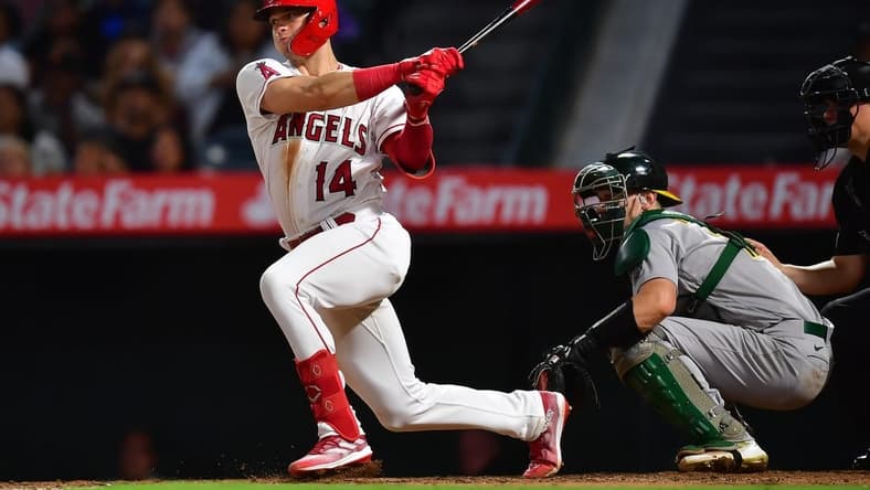 Sep 28, 2022; Anaheim, California, USA; Los Angeles Angels catcher Logan O'Hoppe (14) grounds out against the Oakland Athletics during the fourth inning at Angel Stadium. Mandatory Credit: Gary A. Vasquez-USA TODAY Sports