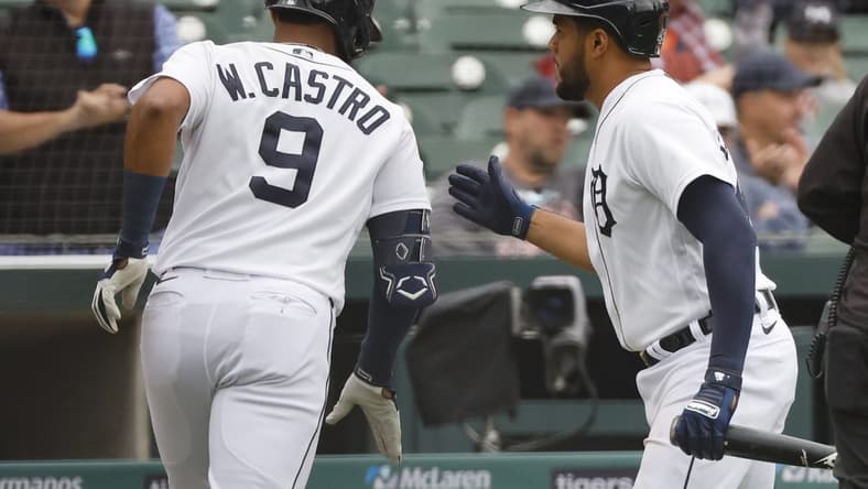 Sep 29, 2022; Detroit, Michigan, USA; Detroit Tigers right fielder Willi Castro (9) receives congratulations from third baseman Jeimer Candelario (46) after he hits a home run in the second inning against the Kansas City Royals at Comerica Park. Mandatory Credit: Rick Osentoski-USA TODAY Sports