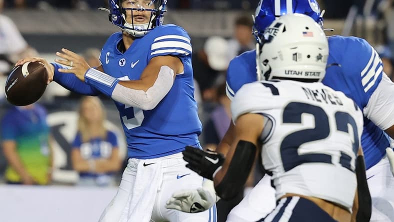 Sep 29, 2022; Provo, Utah, USA;  Brigham Young Cougars quarterback Jaren Hall (3) drops back to pass in the second quarter against the Utah State Aggies at LaVell Edwards Stadium. Mandatory Credit: Rob Gray-USA TODAY Sports