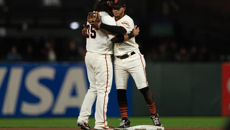 Sep 29, 2022; San Francisco, California, USA; San Francisco Giants shortstop Brandon Crawford (35) celebrates with second baseman Thairo Estrada (39) after defeating the Colorado Rockies at Oracle Park. Mandatory Credit: Stan Szeto-USA TODAY Sports