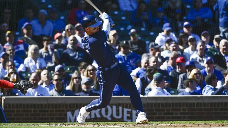 Sep 30, 2022; Chicago, Illinois, USA; Chicago Cubs shortstop Nico Hoerner (2) hits a two run double against the Cincinnati Reds during the second inning at Wrigley Field. Mandatory Credit: Matt Marton-USA TODAY Sports