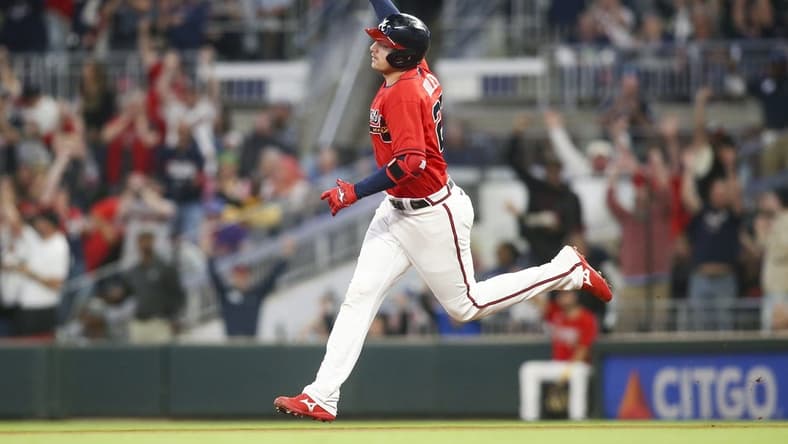 Sep 30, 2022; Atlanta, Georgia, USA; Atlanta Braves third baseman Austin Riley (27) celebrates after a home run against the New York Mets in the second inning at Truist Park. Mandatory Credit: Brett Davis-USA TODAY Sports