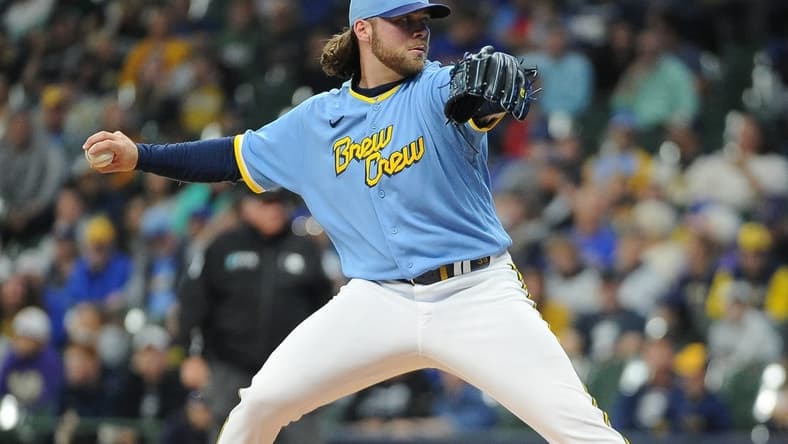 Sep 30, 2022; Milwaukee, Wisconsin, USA; Milwaukee Brewers starting pitcher Corbin Burnes (39) delivers a pitch against the Miami Marlins in the first inning at American Family Field. Mandatory Credit: Michael McLoone-USA TODAY Sports