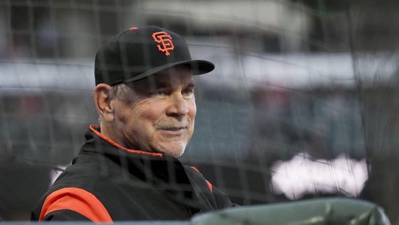 Apr 9, 2019; San Francisco, CA, USA; San Francisco Giants manager Bruce Bochy (15) smiles from the dugout during the second inning against the San Diego Padres at Oracle Park. Mandatory Credit: Kelley L Cox-USA TODAY Sports