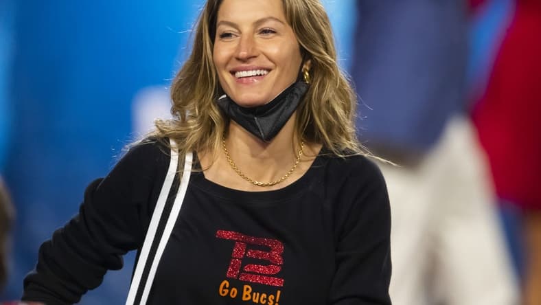 Feb 7, 2021; Tampa, FL, USA;  Gisele Bundchen , wife of Tampa Bay Buccaneers quarterback Tom Brady (not pictured) celebrates after defeating the Kansas City Chiefs in Super Bowl LV at Raymond James Stadium.  Mandatory Credit: Mark J. Rebilas-USA TODAY Sports