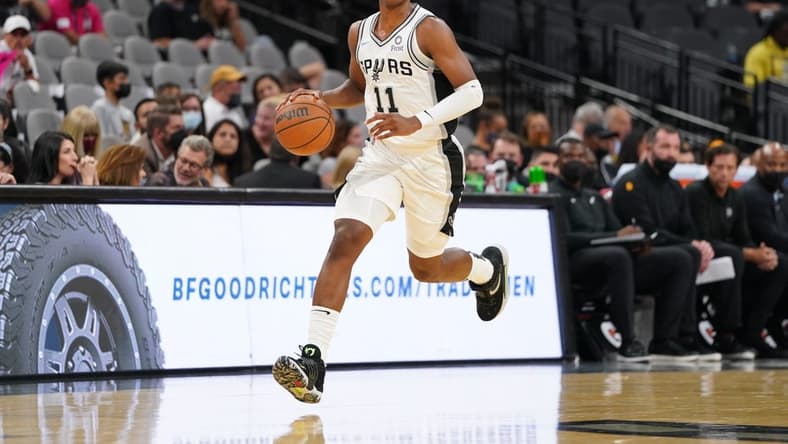 Oct 4, 2021; San Antonio, Texas, USA;  San Antonio Spurs guard Josh Primo (11) dribbles the ball in the second half against the Utah Jazz at the AT&T Center. Mandatory Credit: Daniel Dunn-USA TODAY Sports