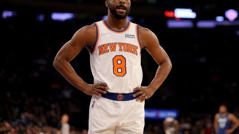 Jan 18, 2022; New York, New York, USA; New York Knicks guard Kemba Walker (8) reacts during the first quarter against the Minnesota Timberwolves at Madison Square Garden. Mandatory Credit: Brad Penner-USA TODAY Sports