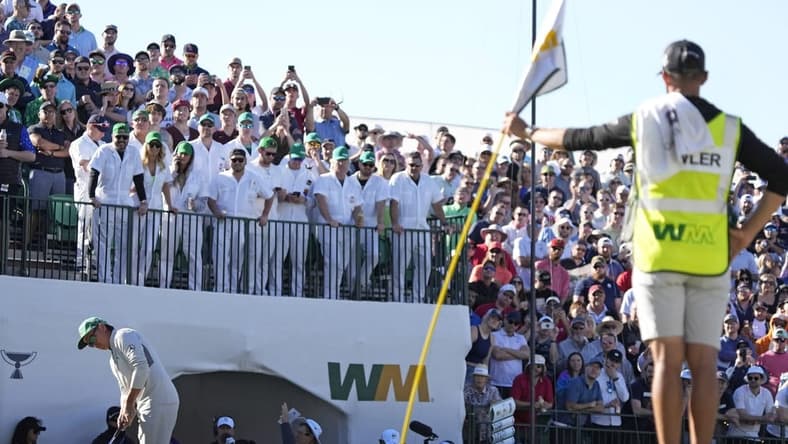 Feb 11, 2022; Scottsdale, Arizona, USA;  Rickie Fowler putts on the 16th green during Round 2 of the WM Phoenix Open at TPC Scottsdale.

Pga Phoenix Open
